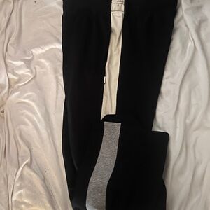 Fabletics sweat pants. 
Navy blue with white stripes on the sides
